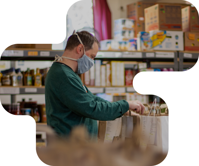 Person working in a pantry packaging food